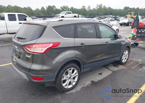 2015 Ford Escape Titanium z USA, uszkodzony, nr VIN 1FMCU0JX9FUC31859